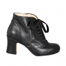 Woman’s black leather...