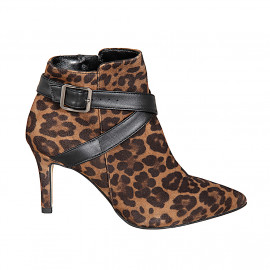 Woman’s pointed-toe ankle...