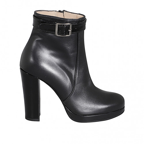 Woman’s black leather platform ankle boots with a black patent leather strap and side zipper heel 10 - Available sizes:  32, 33, 34, 42, 43, 44, 45, 46, 47