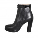 Woman’s black leather platform ankle boots with a black patent leather strap and side zipper heel 10 - Available sizes:  32, 33, 34, 42, 43, 44, 45, 46, 47