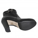 Woman’s black leather platform ankle boots with a black patent leather strap and side zipper heel 10 - Available sizes:  32, 33, 34, 42, 43, 44, 45, 46, 47