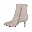 Woman’s pointed-toe nude leather ankle boots with zipper, heel 7 - Available sizes:  33, 34, 35