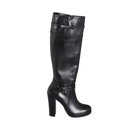 Woman’s black leather boots...