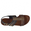 Woman's sandal with studs in black and dark brown python printed leather and dark brown snake-skin printed leather - Available sizes:  32