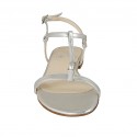 Woman's sandal with buckle in silver laminated leather heel 1 - Available sizes:  32
