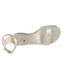 Woman's open shoe with strap in platinum laminated leather heel 1 - Available sizes:  33