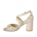 Woman's open shoe with crossed strap and studs in nude leather heel 7 - Available sizes:  42, 43, 45