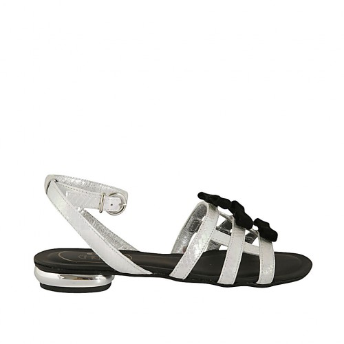 Woman's sandal with anklestrap in holographic white and rose printed leather with bows in black suede heel 1 - Available sizes:  33, 34