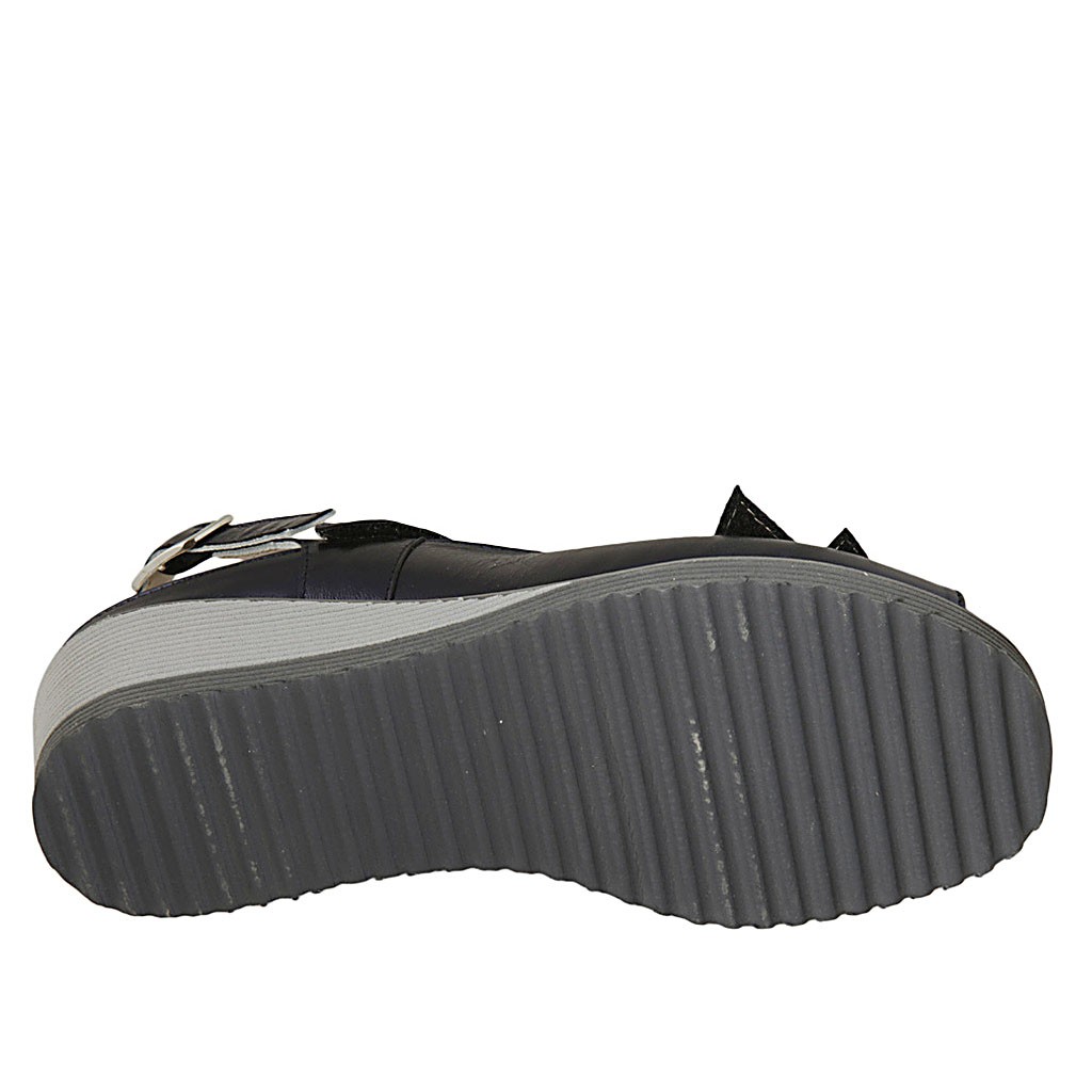 Woman's sandal with velcro strap and removable insole in blue laminated leather wedge heel 4