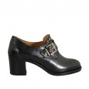 Woman's highfronted shoe with buckle and studs in black leather heel 6 - Available sizes:  43