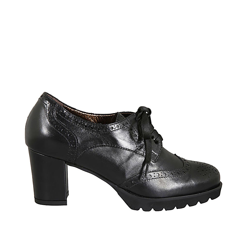 black wingtip heels