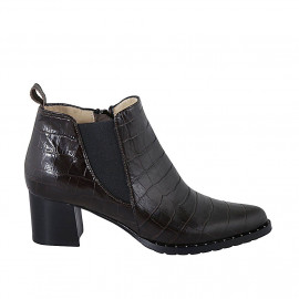 Woman's pointy ankle boot with zipper, studs and elastic band in brown printed leather heel 55 - Available sizes: 42