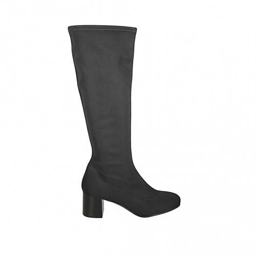 Woman's boot in black elastic fabric...