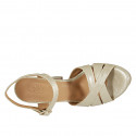 Woman's platform sandal with ankle strap in laminated platinum leather heel 10 - Available sizes:  42