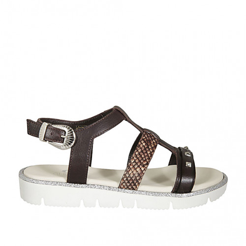 Woman's sandal with studs in brown...