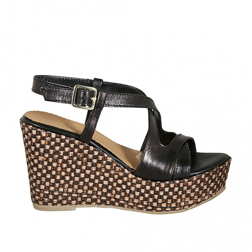 Woman s sandal in black leather with crossed strap platform and braided wedge heel 9