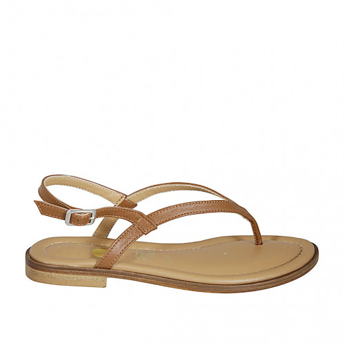 Woman's thong sandal in brown leather...