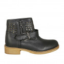 Woman's ankle boot with buckle and zipper in black leather and pierced leather heel 3 - Available sizes:  42, 43