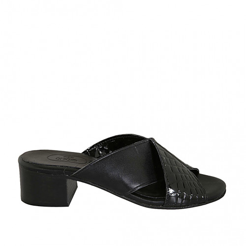 Woman's mules in black leather and...