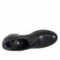 Woman's highfronted shoe with elastic band in black leather heel 5 - Available sizes:  32, 33, 43