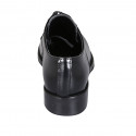 Woman's laced derby shoe in black brush-off leather with Brogue pattern heel 3 - Available sizes:  44, 45